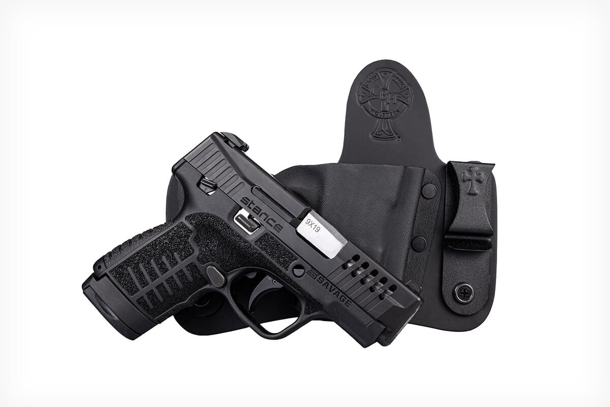 savage pistol with holster behind it