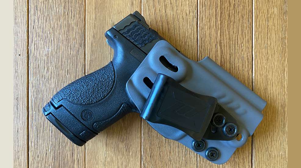 handgun in holster