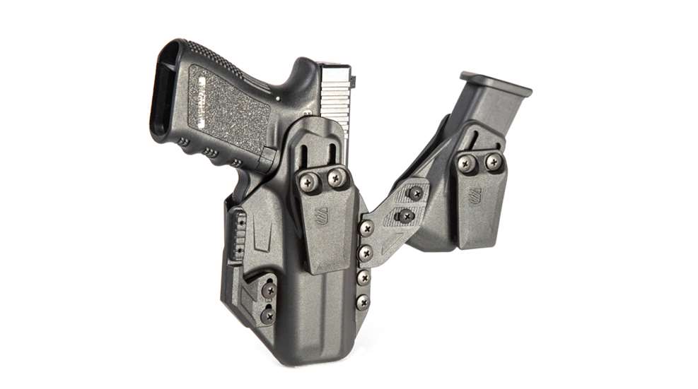holster and magazine carrier with pistol and magazine inserted