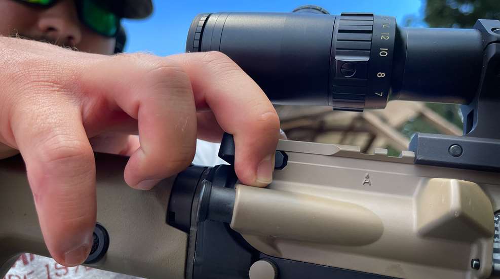 side charging vs rear charging handle