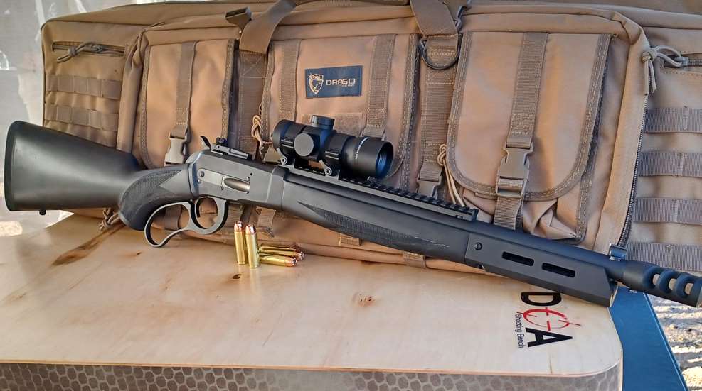 Lever action rifle facing right