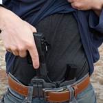concealed handgun being drawn