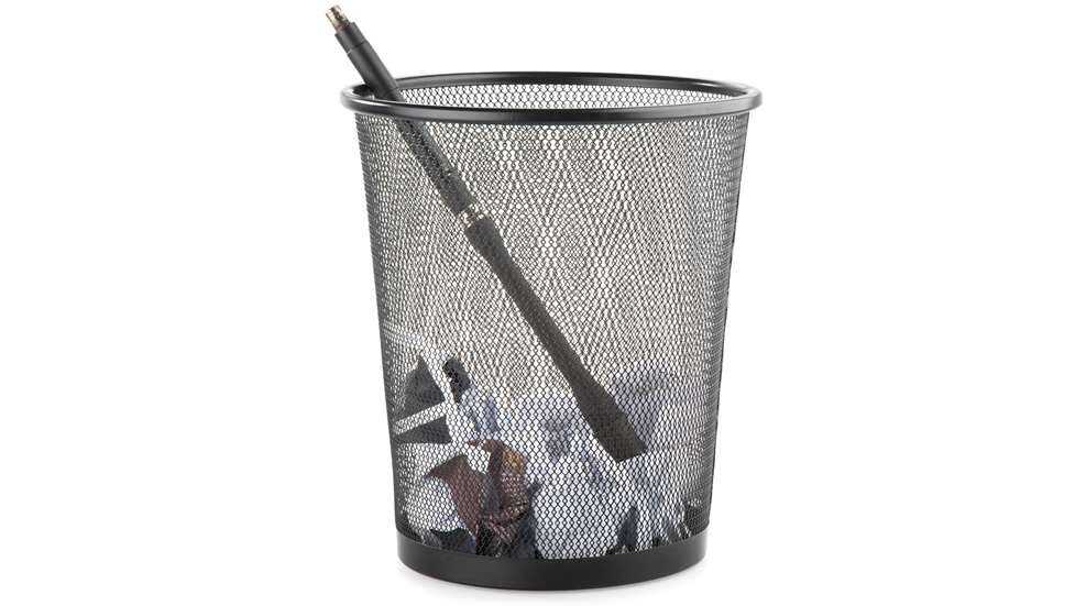 rifle in trashcan