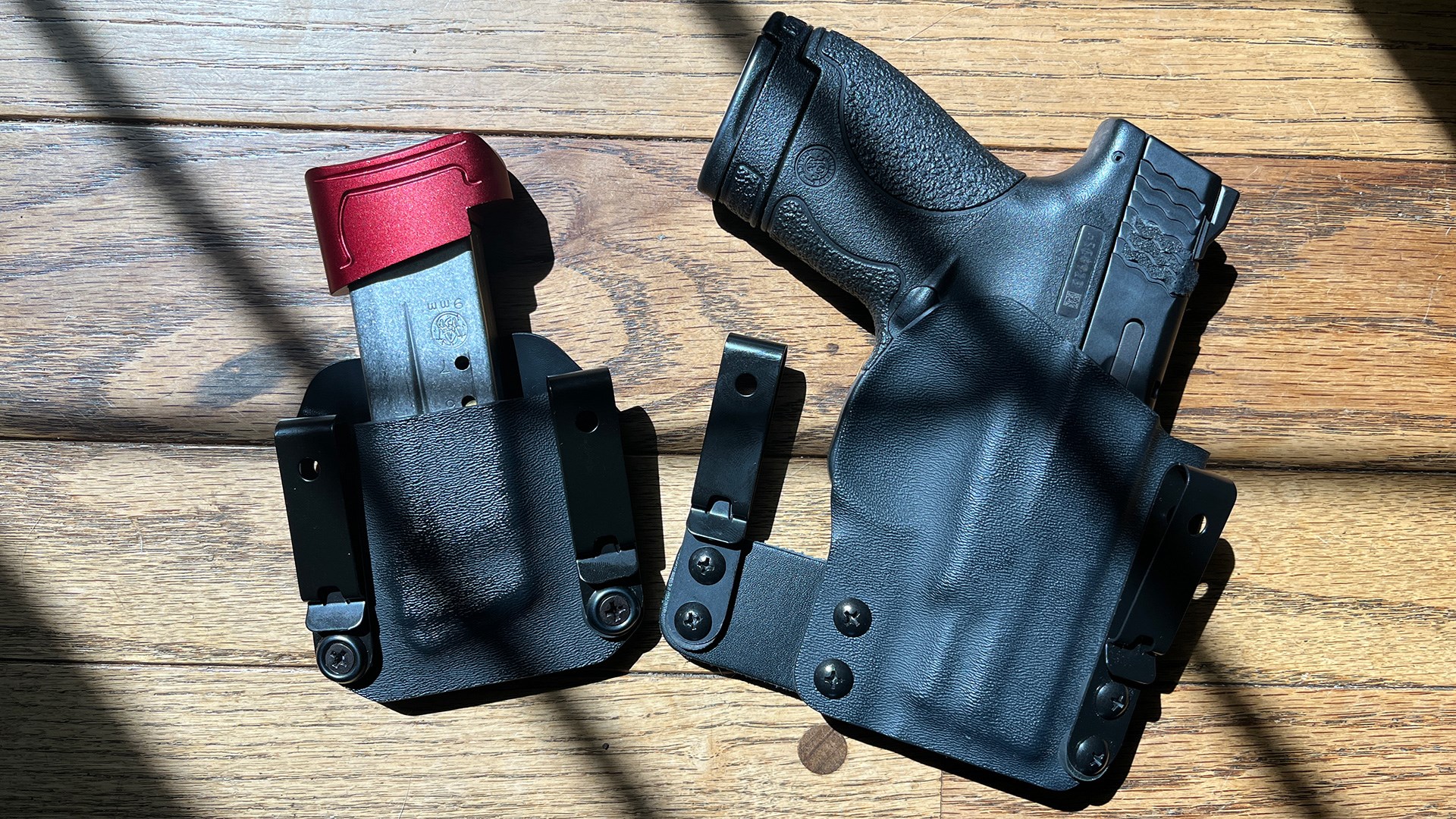 Holster and magazine pouch