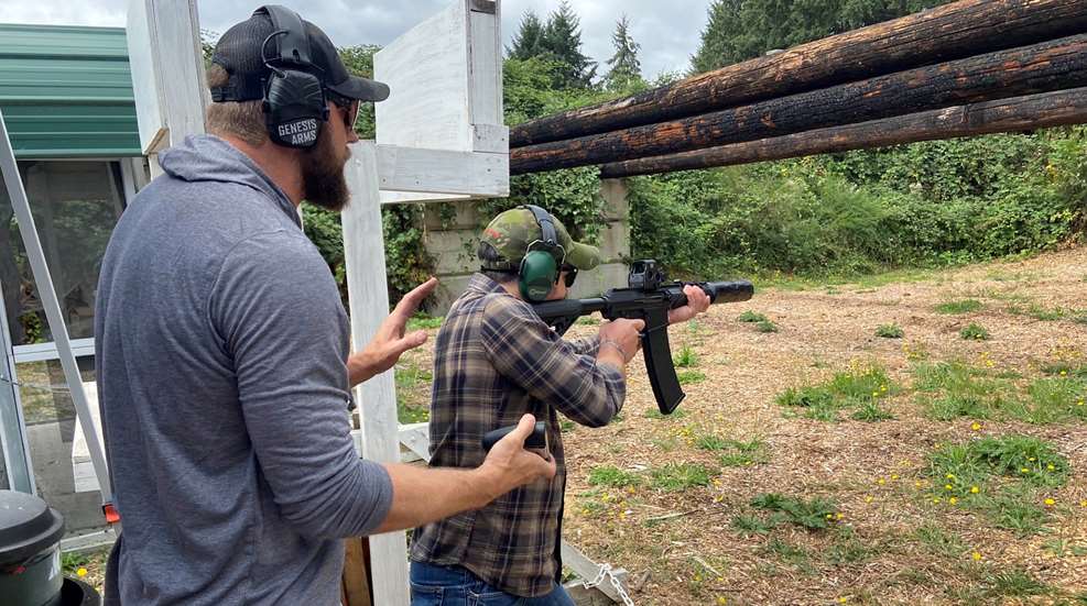 HAVA range event with veteran holding rifle