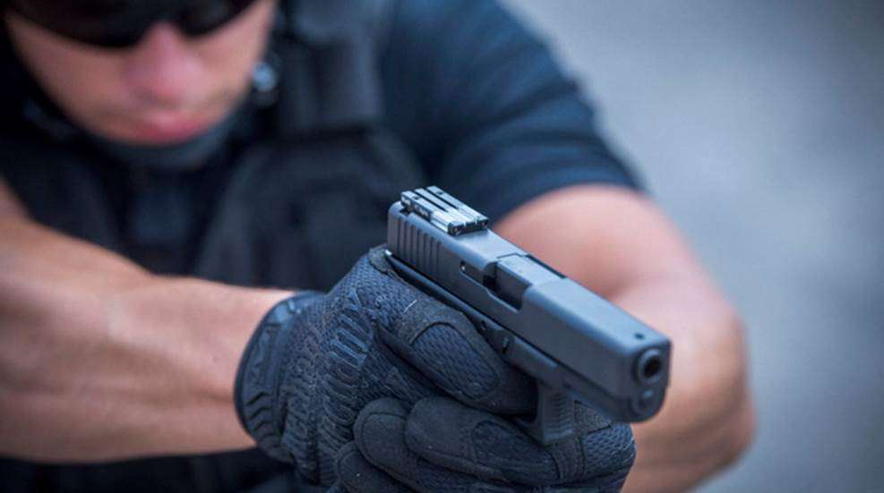 Man holding pistol