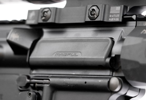 Magpul ejection port