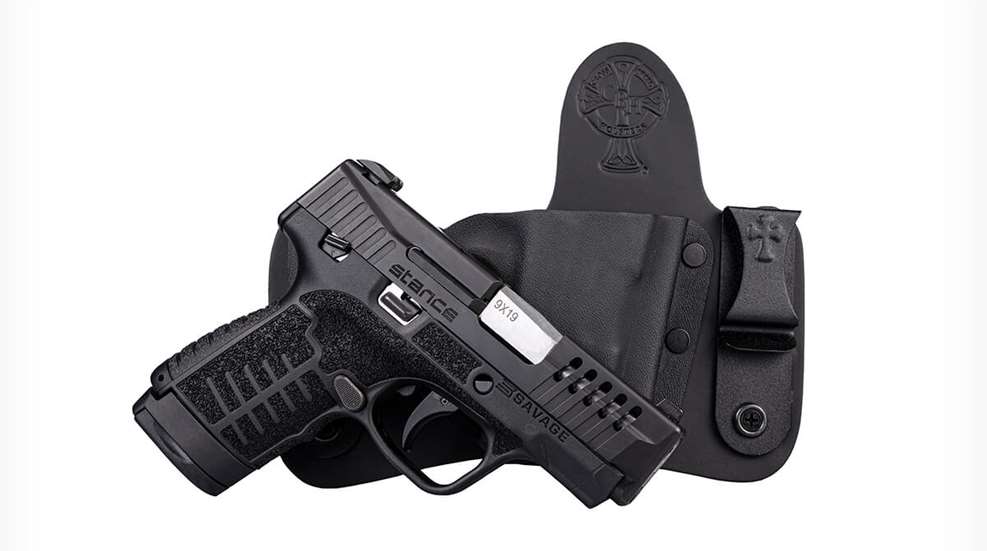savage pistol with holster behind it
