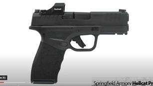 Springfield Armory Hellcat Pro pistol with Bushnell red dot facing right