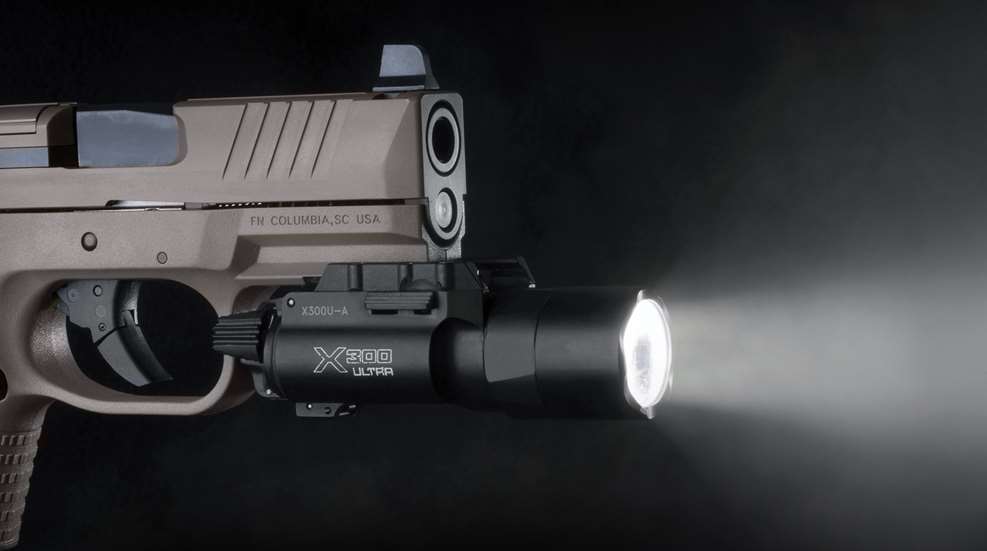 pistol with flashlight mounted
