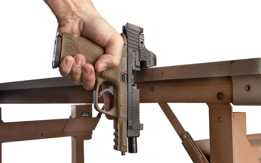 charging your handgun on the edge of a table