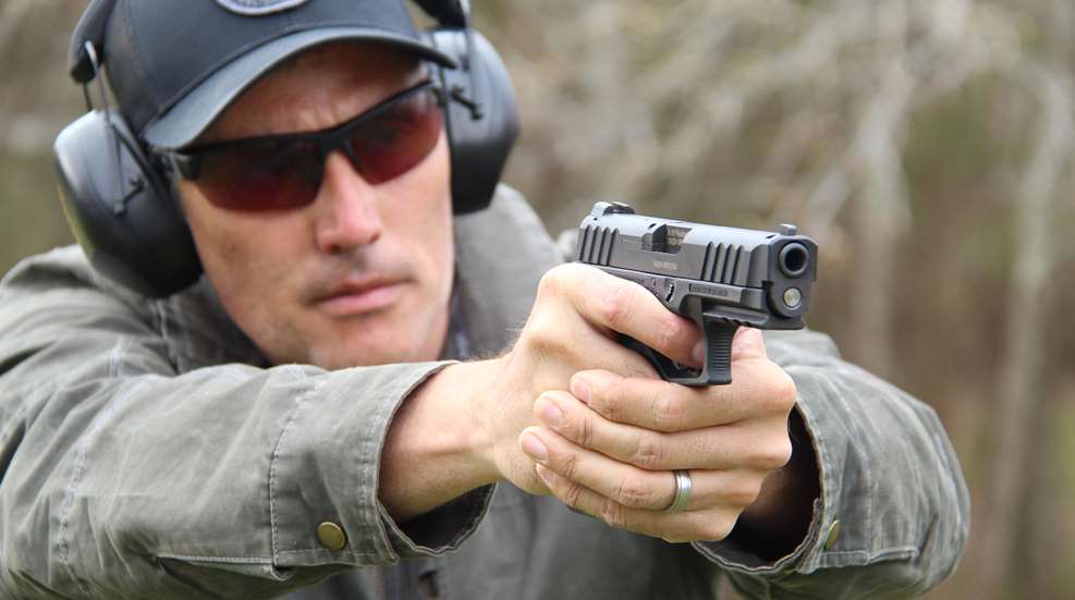 man with handgun
