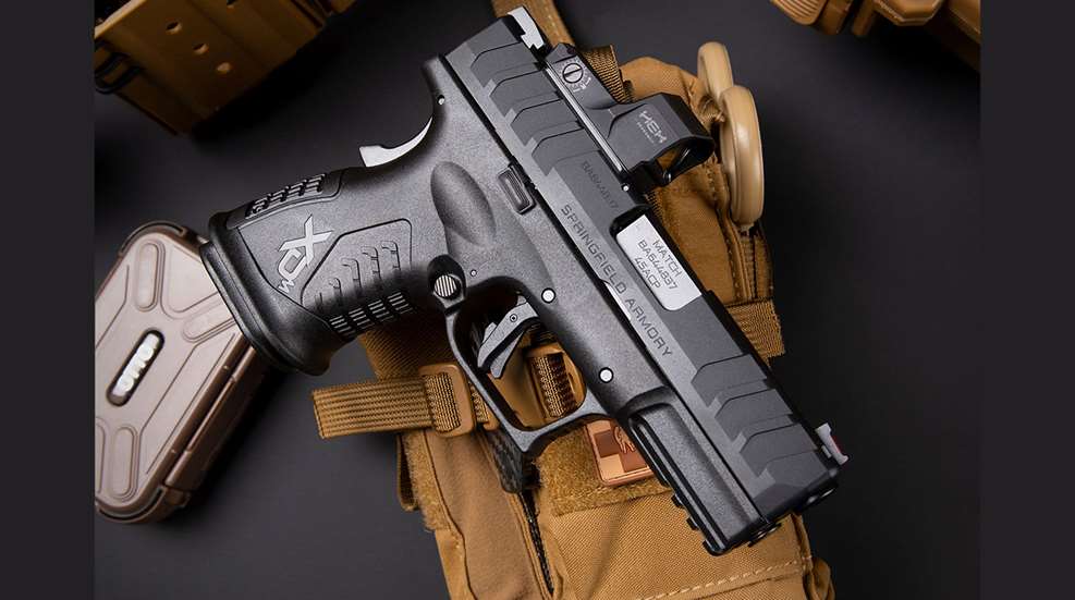 handgun with red dot sight