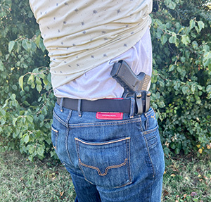 Inside the waistband on the hip is a common carry position.