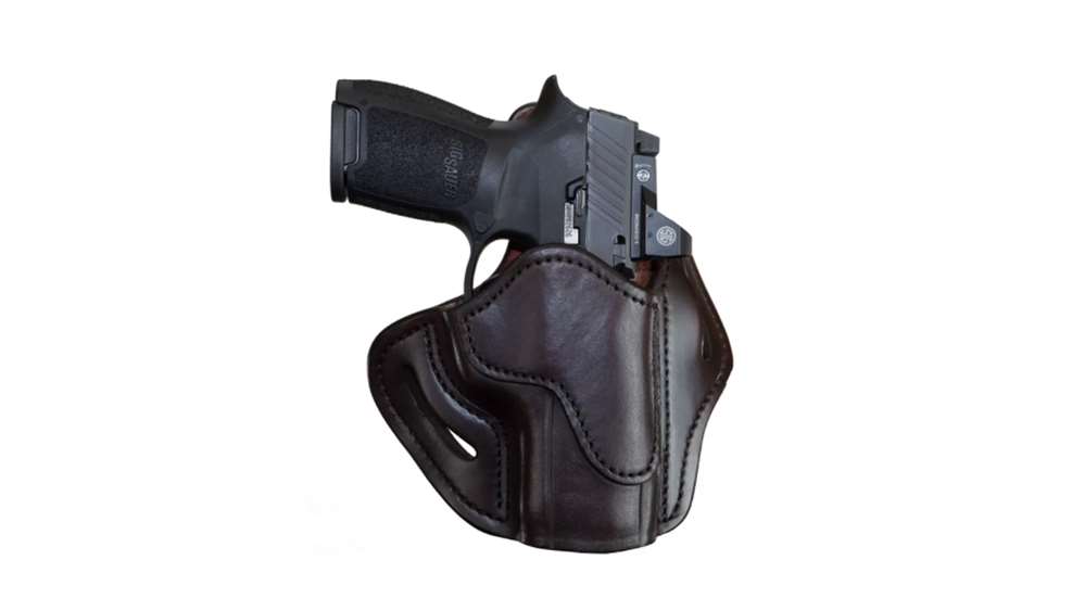 Pistol with red dot in holster