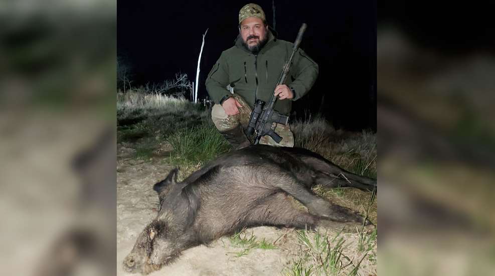 hunter with Boar