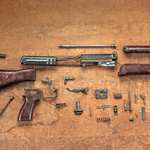 disassembled rifle