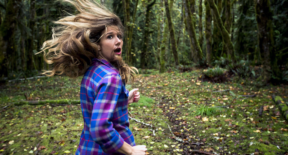 woman running in fear