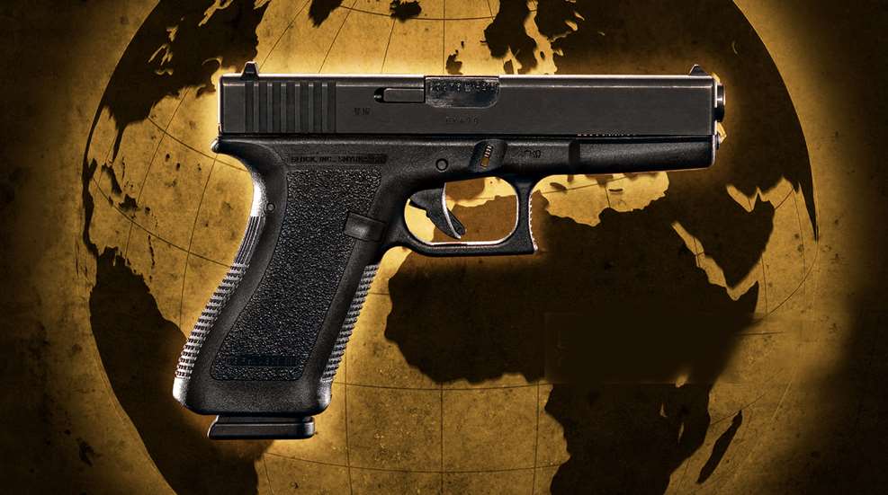 gun over earth graphic